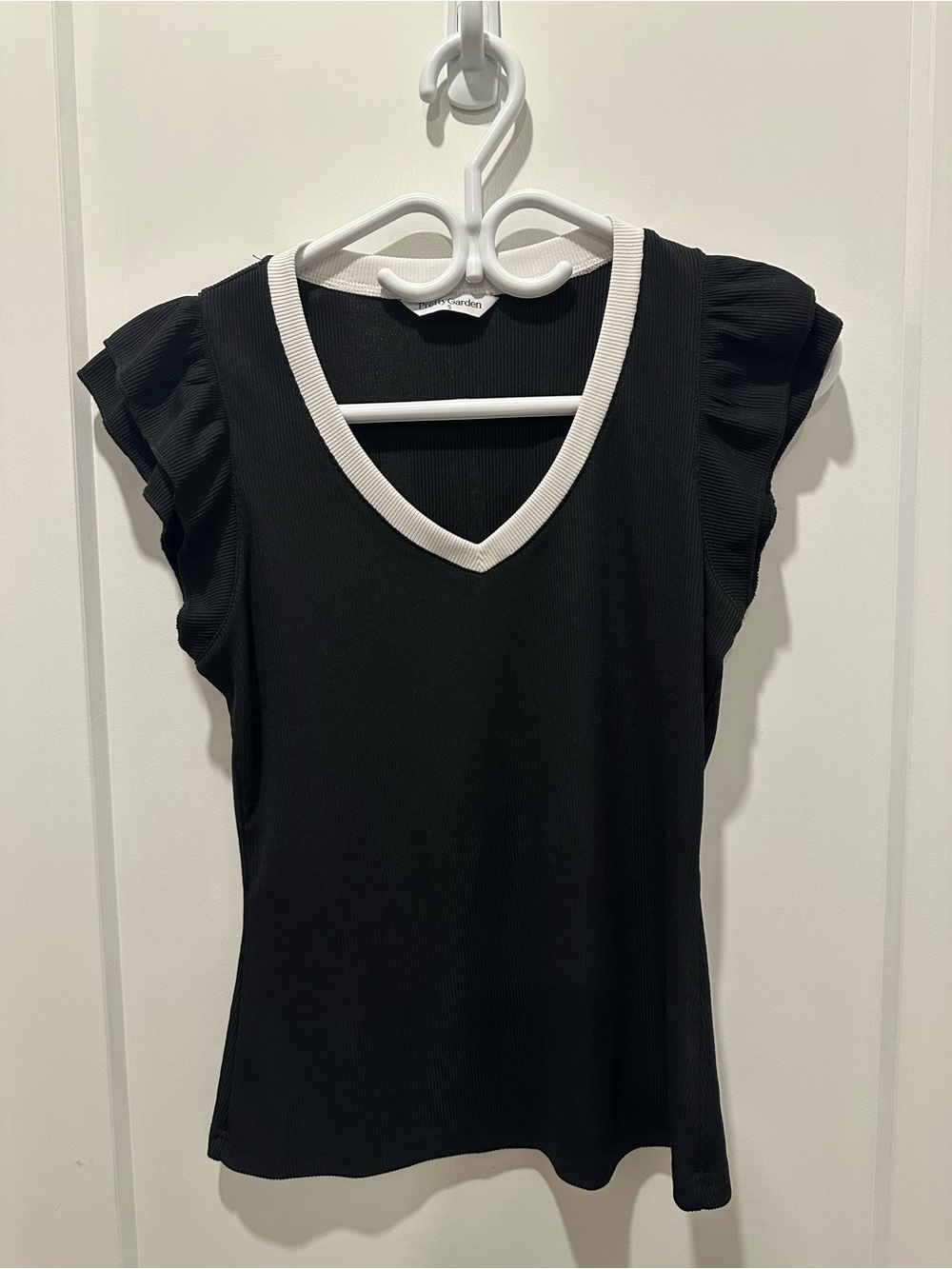 Black V-Neck Ruffle Sleeve Top with White Trim
